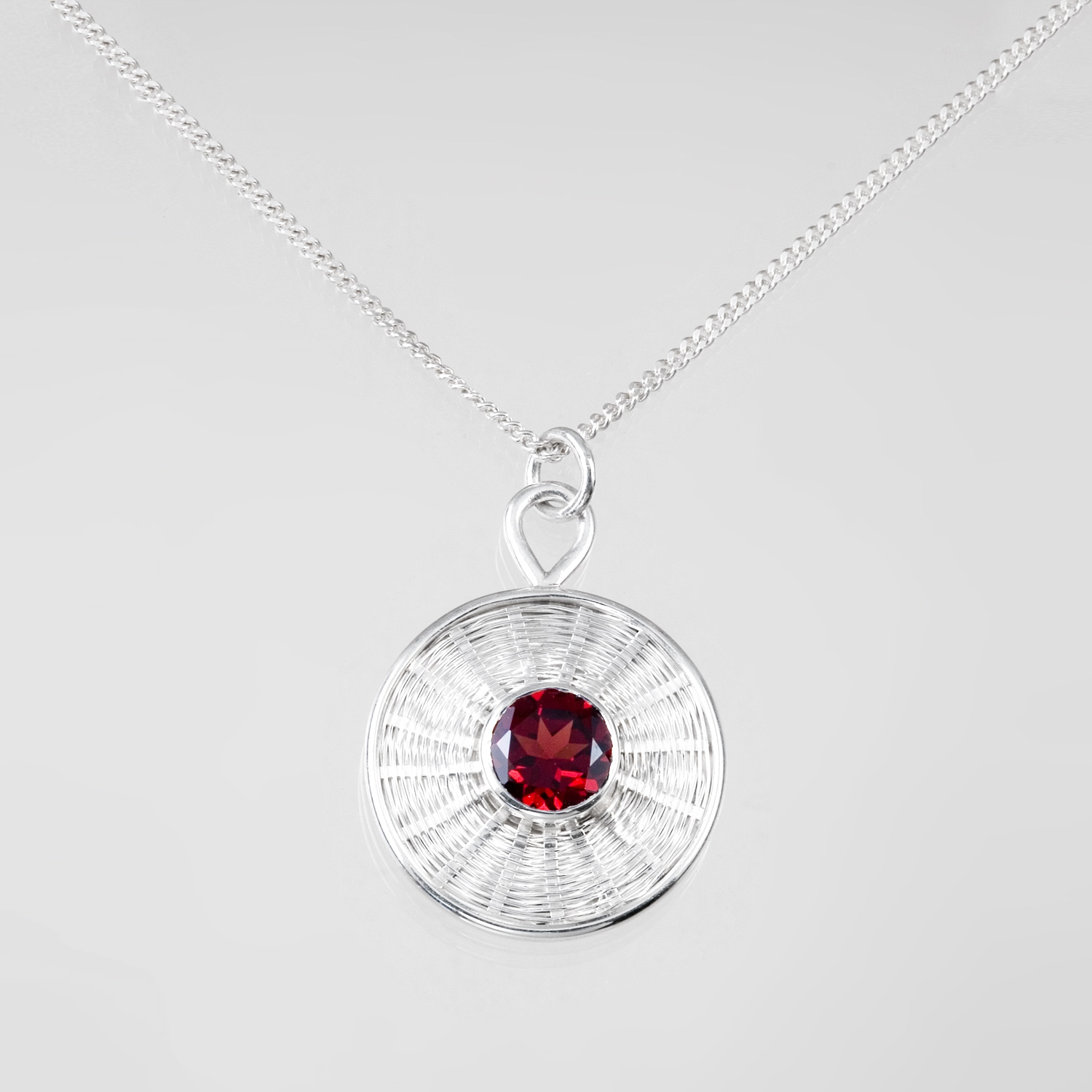 Almadine Garnet Pendant in sterling and fine silver by Tamberlaine