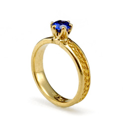Sapphire Solitaire Ring in 18k gold with 22k weave
